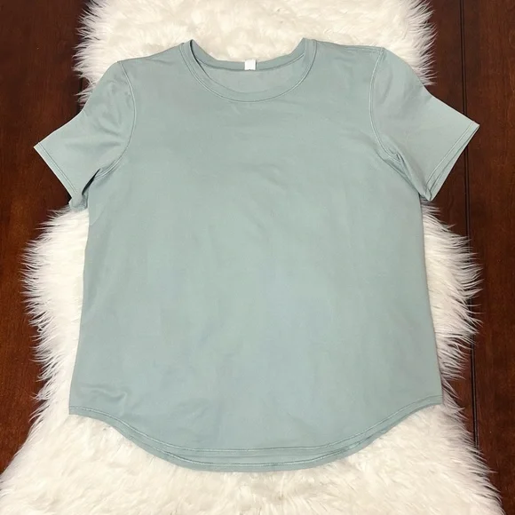 Lululemon Size 8 High-Neck Running and Training T-Shirt
Silver Blue Light Green - Picture 4 of 13